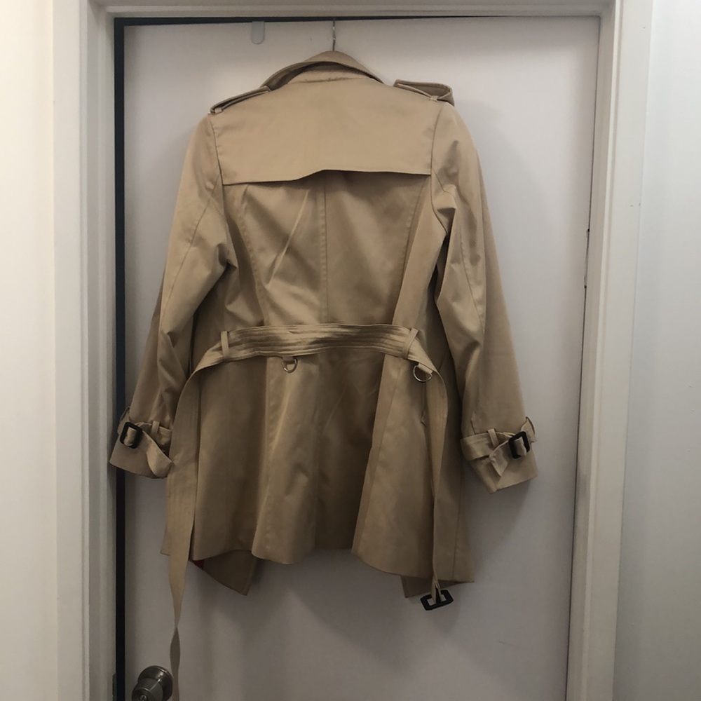 Trench coat fits medium, hits mid-thigh. Barbie pink lined. Inside pocket. - Picture 3 of 3